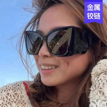 Модерни дамски слънчеви очила в по-широка рамка, популярни в Интернет, като слънчеви очила за street фотография в стил хип-хоп